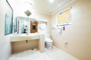 Vannituba majutusasutuses Wen Sha Bao Motel-Xinying