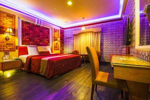 Voodi või voodid majutusasutuse Wen Sha Bao Motel-Xinying toas
