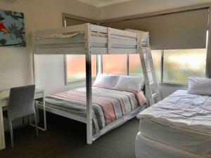 Giường trong phòng chung tại D119 Silver Birch Family Stay