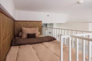 Ένα ή περισσότερα κρεβάτια σε δωμάτιο στο Calma Studio I @Skyhouse Apartment +12 φωτογραφίες