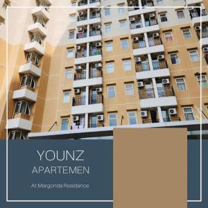 an image of a tall apartment building at Younz Apartemen By Margonda Residence 2 in Pondokcina +17 photos