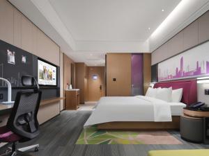 Voodi või voodid majutusasutuse Hampton by Hilton Shenzhen Longhua Qinghu toas