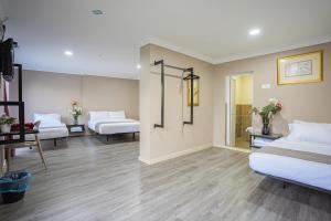 Postel nebo postele na pokoji v ubytování HOTEL 28 RAPID