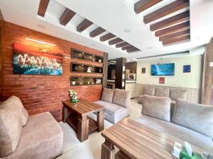 Posezení v ubytování Satkar Boutique Home