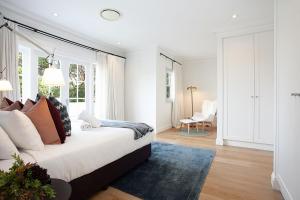 Postel nebo postele na pokoji v ubytování The Sienna Rose Bay + 24 fotografií