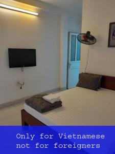 A bed or beds in a room at Âu Việt - 168 Ngọc Thụy - by Bay Hostel