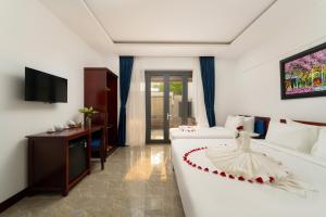 Μια τηλεόραση ή/και κέντρο ψυχαγωγίας στο May Boutique Villa Hội An