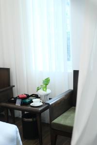 Postel nebo postele na pokoji v ubytování Paul Chabot Hotel