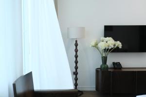TV a/nebo společenská místnost v ubytování Paul Chabot Hotel