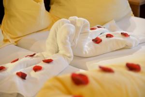 Krevet ili kreveti u jedinici u okviru objekta Hotel Garni Bavaria