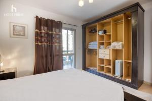 Postel nebo postele na pokoji v ubytování Host Prime Apartment In Rehab City 2