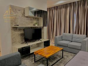 TV a/nebo společenská místnost v ubytování Encorp Marina Residences 19