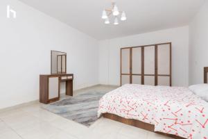 Postel nebo postele na pokoji v ubytování Host Prime Apartment In Rehab City 2
