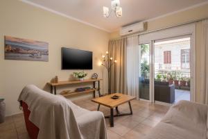 Μια τηλεόραση ή/και κέντρο ψυχαγωγίας στο Natalia Guest House