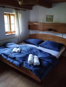Postel nebo postele na pokoji v ubytování Chaloupka u Jiřího