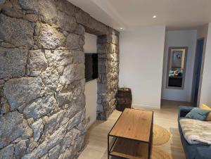 Μια τηλεόραση ή/και κέντρο ψυχαγωγίας στο Appartement proche de Porto-Vecchio