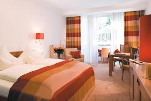 Postel nebo postele na pokoji v ubytování Hotel Deimann