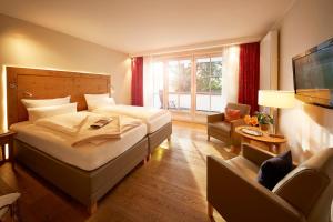Postel nebo postele na pokoji v ubytování Hotel Deimann