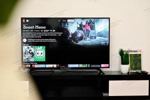 a computer monitor sitting on top of a desk at Kuching Vivacity Jazz 1 Netflix in Kuching