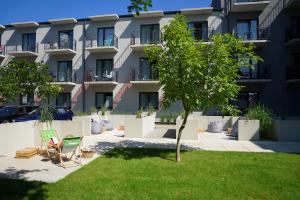 Vonkajšia záhrada v ubytovaní IND.U Apartamenty