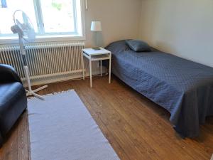 Ένα ή περισσότερα κρεβάτια σε δωμάτιο στο Korsnäsgården +2 φωτογραφίες