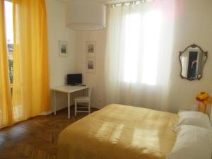 Postel nebo postele na pokoji v ubytování B&B ROSSANA