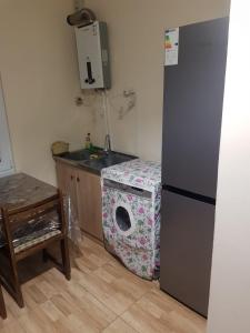 Kuchyň nebo kuchyňský kout v ubytování IDEA Guest House / ИДЕА гостевой дом + 23 fotografií