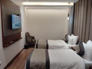 Postel nebo postele na pokoji v ubytování Western Blu INN