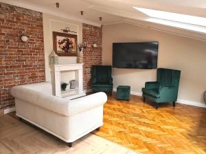 Posezení v ubytování WANNA SPA na Starym Mieście