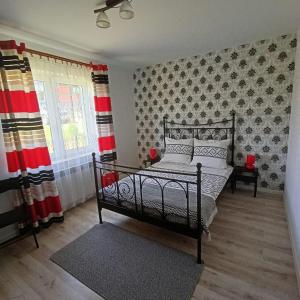 Postel nebo postele na pokoji v ubytování Noclegi U Janusza - Bieszczady