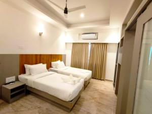 Hotel GSR Tumkur客房内的一张或多张床位