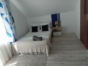 Postel nebo postele na pokoji v ubytování Noclegi U Janusza - Bieszczady