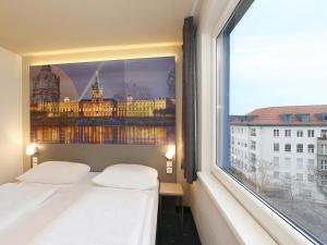 Postel nebo postele na pokoji v ubytování B&B Hotel Berlin City-West