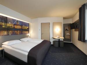 Postel nebo postele na pokoji v ubytování B&B Hotel Berlin City-West