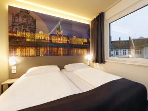Postel nebo postele na pokoji v ubytování B&B Hotel Berlin City-West
