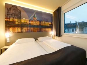 Postel nebo postele na pokoji v ubytování B&B Hotel Berlin City-West
