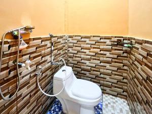 Gallery image of Penginapan Dvn & Tmy 01 Mitra RedDoorz in Palembang