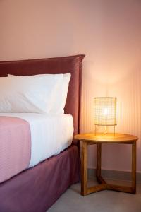 Postel nebo postele na pokoji v ubytování nárciso, elegant living