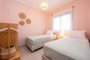 Postel nebo postele na pokoji v ubytování nárciso, elegant living