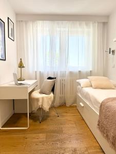 Posteľ alebo postele v izbe v ubytovaní Przytulny apartament 5 minut od morza