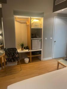 Kuchyň nebo kuchyňský kout v ubytování Kreoli Hotel