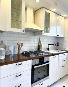 Kuchyňa alebo kuchynka v ubytovaní Przytulny apartament 5 minut od morza