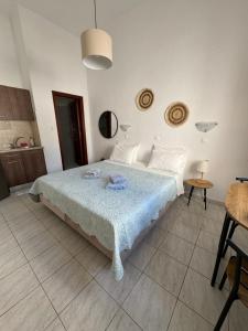 Postel nebo postele na pokoji v ubytování Fedra Apartments Lindos