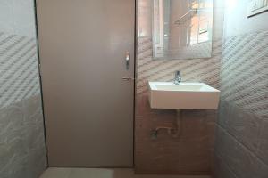 Ένα μπάνιο στο Hotel Apratim Lodging & Boarding