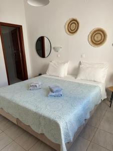 Postel nebo postele na pokoji v ubytování Fedra Apartments Lindos