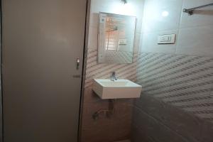 Ένα μπάνιο στο Hotel Apratim Lodging & Boarding