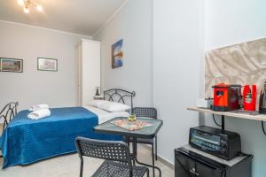 Ένα ή περισσότερα κρεβάτια σε δωμάτιο στο Al nitta 2