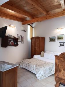 Postel nebo postele na pokoji v ubytování Guest House Lucijo