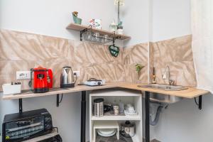 Η κουζίνα ή μικρή κουζίνα στο Al nitta 2