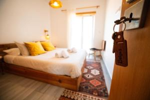 Postel nebo postele na pokoji v ubytování Alex Surf Hostel